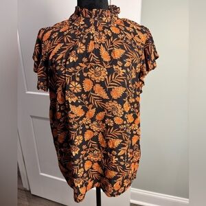 Elan NWT floral print mock neck flutter sleeve black and orange top
